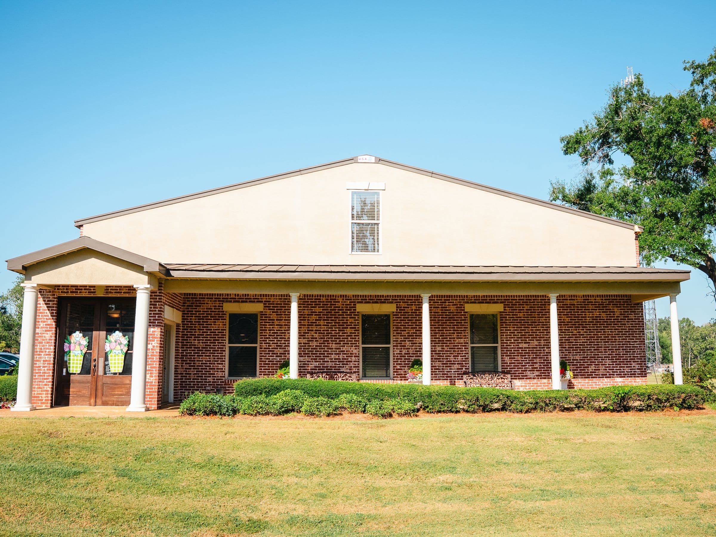 The Park Place Dental building, brick with a columned porch, on North 3rd Street in Booneville