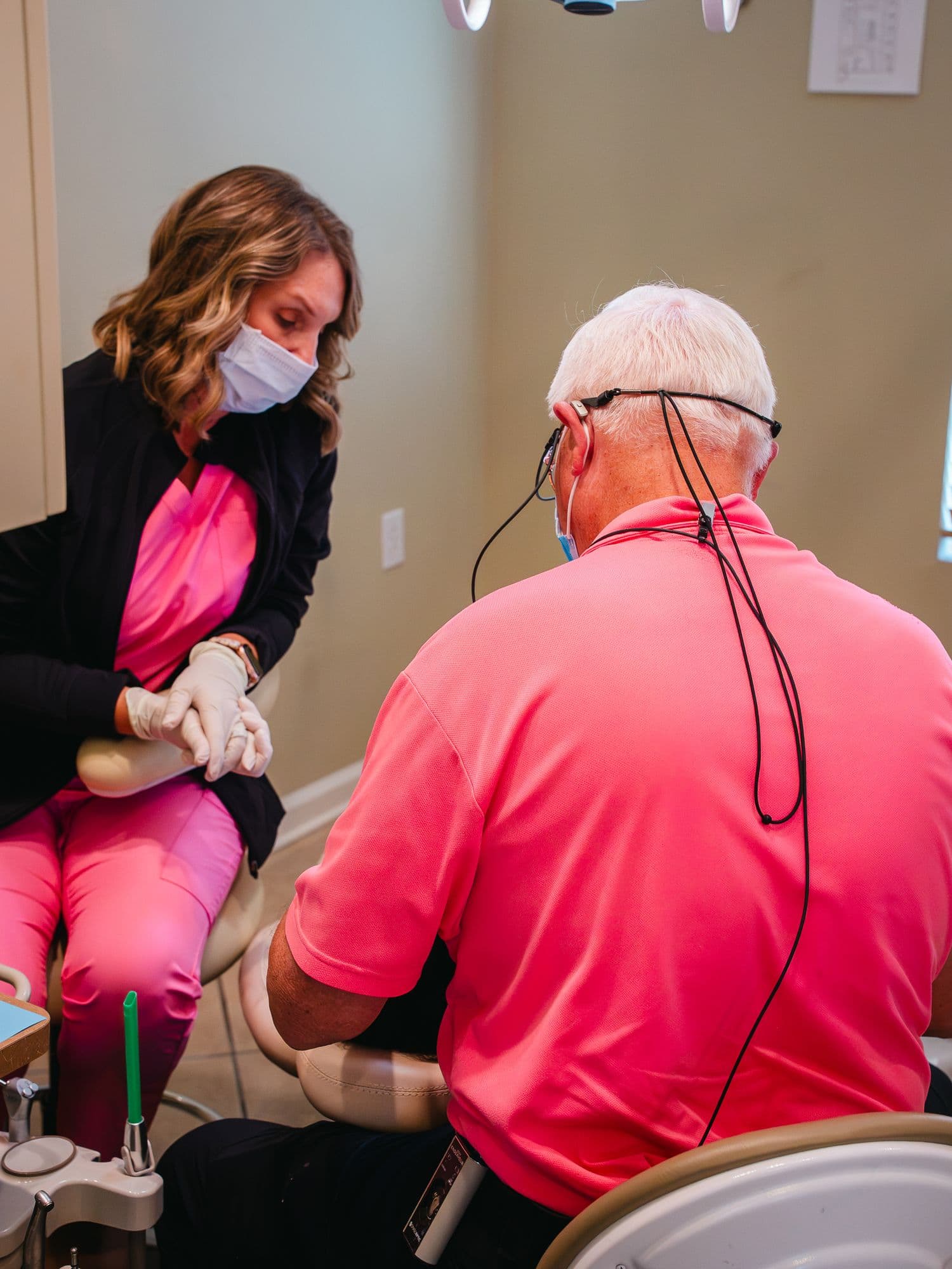 Dr. Ken Goodwin with a member of the dental team