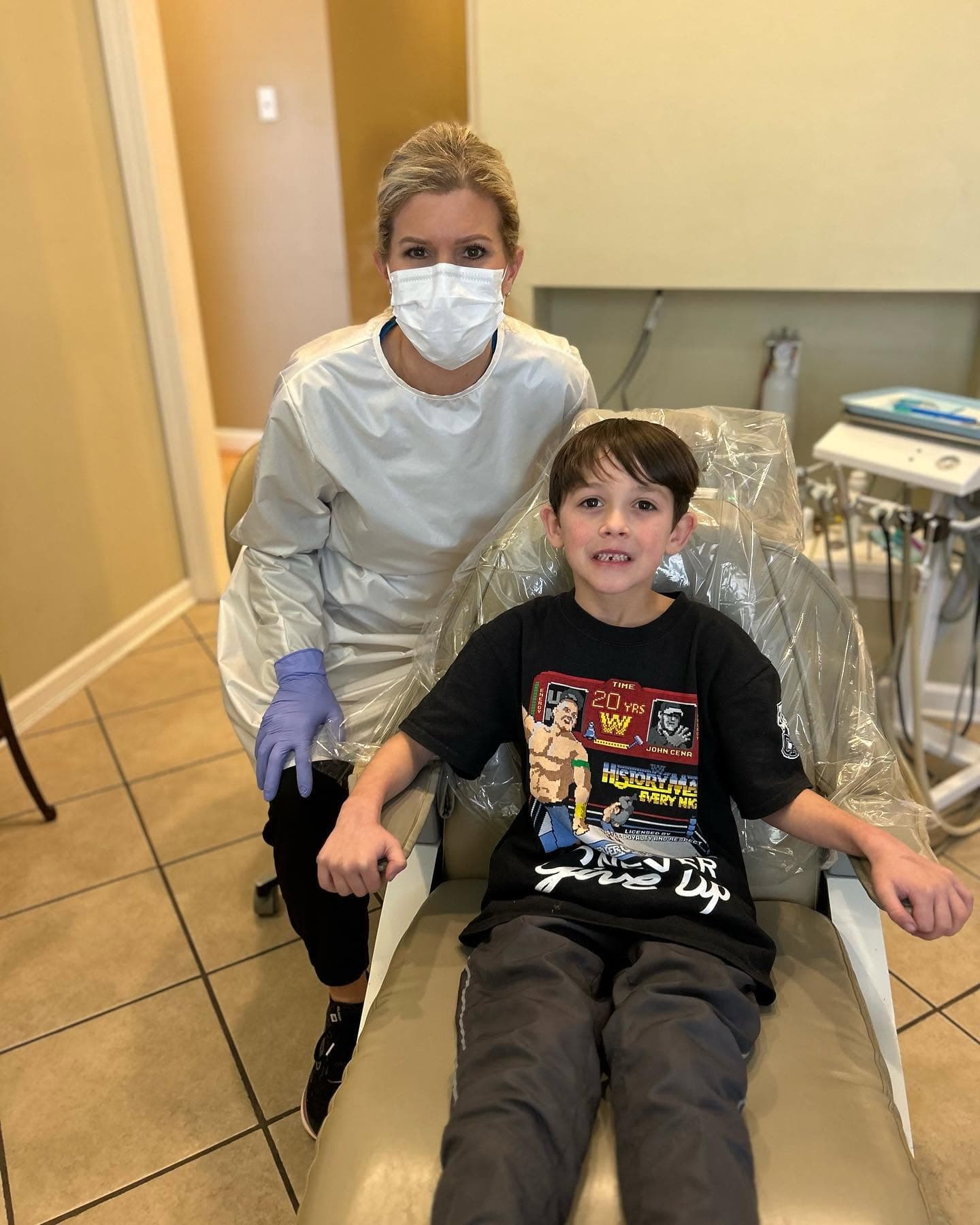 A hygienist with a young patient at Park Place Dental