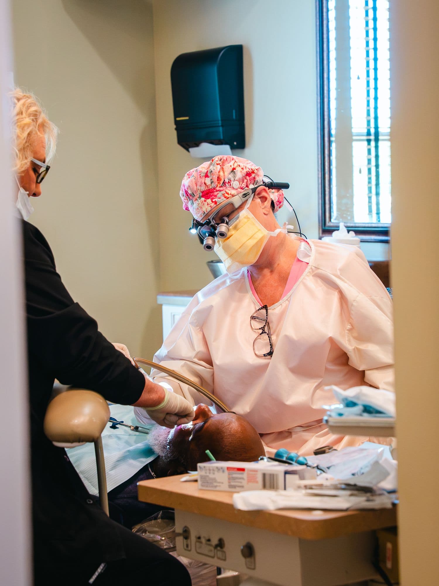 Dr. Rebecca McDougald working under magnifying loupes at Park Place Dental